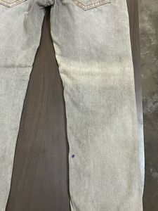 TRUE RELIGION WITH SMALL INK DOT AT BACK