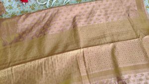 jari woven shiney chiku colour saree