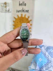 Elegant Oval Green Dial Watch