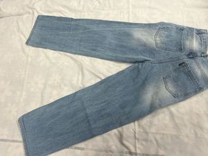 washed out distressed Blue baggy Jeans