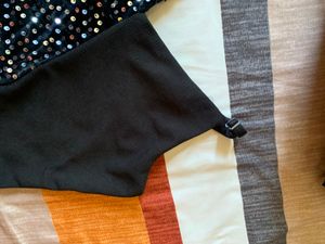 It’s A Black Skirt And Top For Women