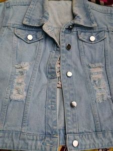 Distressed Light Wash Denim Jacket