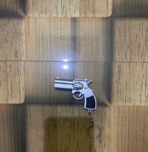 Gun key chain with light and laser