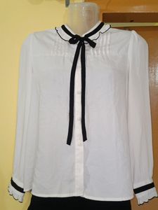 Classic White Blouse with Black Accents