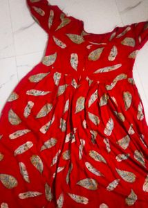 girls red frock + gift
