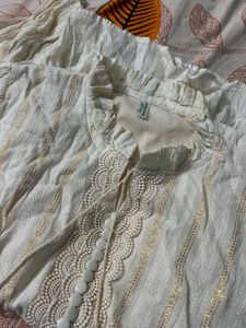 Elegant White Kurta with Metallic Stripes