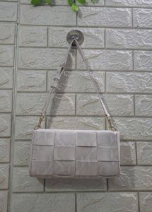 Charles & Keith Woven Clutch Bag