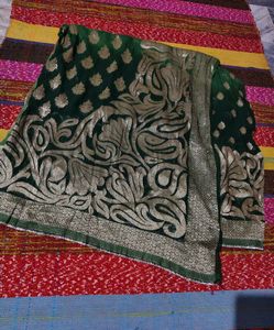Elegant Green Saree with Gold Embellishments