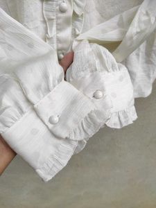 Elegant White Ruffled Blouse
