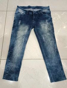 Distressed Blue Denim Jeans