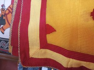 Vibrant Yellow Saree with Red Border