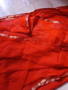 Orange Saree with Floral Embellishments