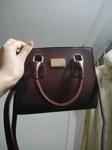 Elegant Maroon Handbag with Shoulder Strap