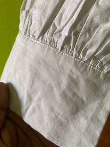 White Ruffle Button-Down Shirt