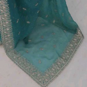 Elegant Teal Embroidered Saree
