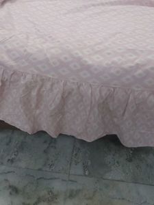 Pink Diamond Pattern Bedspread with frill.