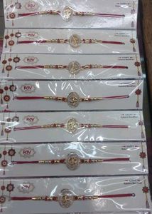 Designer Rakhi with Om Symbol combo Of 12 pc