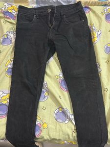 Faded black jeans