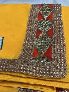 Vibrant Yellow Embellished Saree