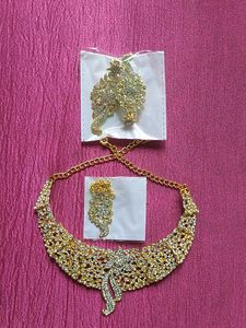 Stunning Gold and Crystal Necklace,with given eari