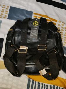 Black Faux Leather Backpack