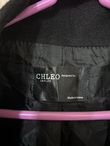 Chic Black Double-Breasted Cape Jacket