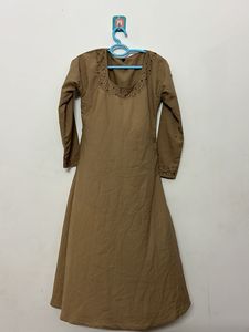 Elegant Brown Kurta with Embellished Neckline