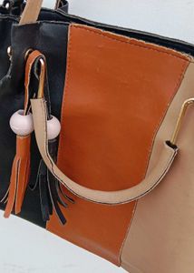 Stylish Colorblock Handbag with Tassel Charm