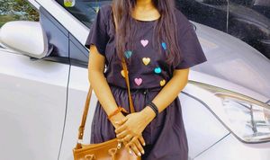 Black T-Shirt with Heart Embellishments