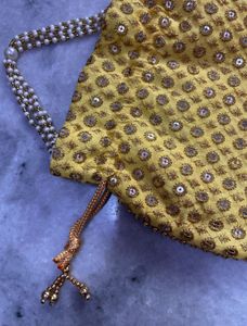Embellished Yellow Potli Bag