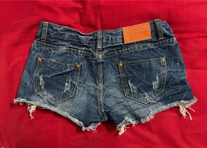 Distressed Denim Shorts with Lace Trim