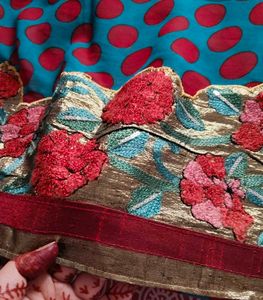 Beautiful Teal Saree with Red Polka Dots