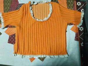 This top has a charming, cottagecore-inspired vibe