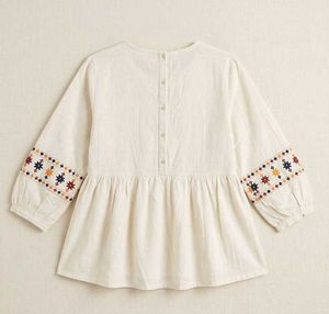 cotton embroidered peplum blouse