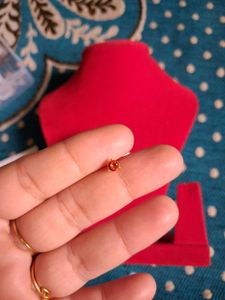 beautiful orange color nosepin  gold