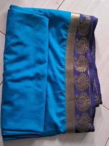 Elegant Teal Saree with Paisley Border