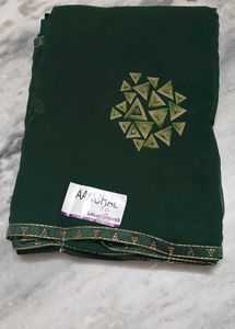 Elegant Green Saree with Triangles