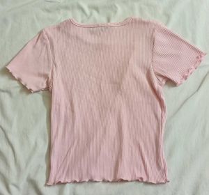 pink ribbed button-up crop top