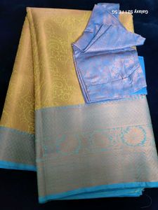 Elegant Yellow Saree with Blue Blouse Piece