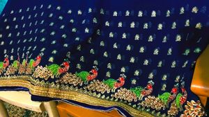 Exquisite Blue Saree with Peacock Embroidery