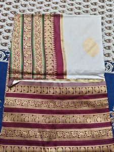 Elegant White Saree with Maroon Border