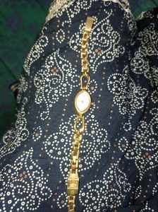 Elegant Gold Tone Oval Watch