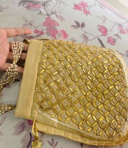 Elegant Gold Embroidered Clutch