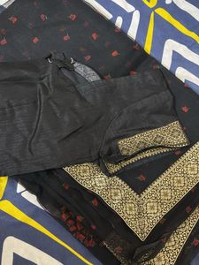 Elegant Black Saree with Floral Motifs