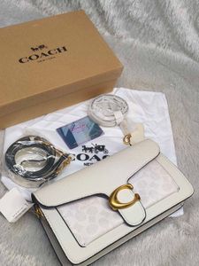 Coach Tabby Off White with c print.