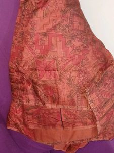 Vibrant Orange Saree with Floral Print