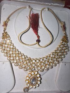Elegant Pearl and Crystal Necklace with saree pin