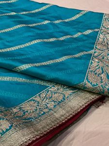 Stunning Teal Saree with Silver Border