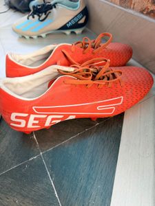 Vibrant Orange Soccer Cleats