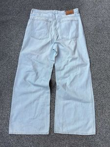 Wide Leg Distressed Jeans - Light Wash